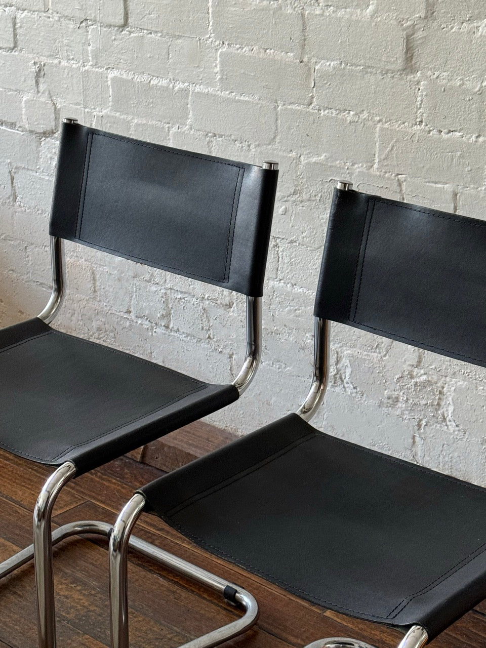 Pair of Black Leather Cantilever Chairs
