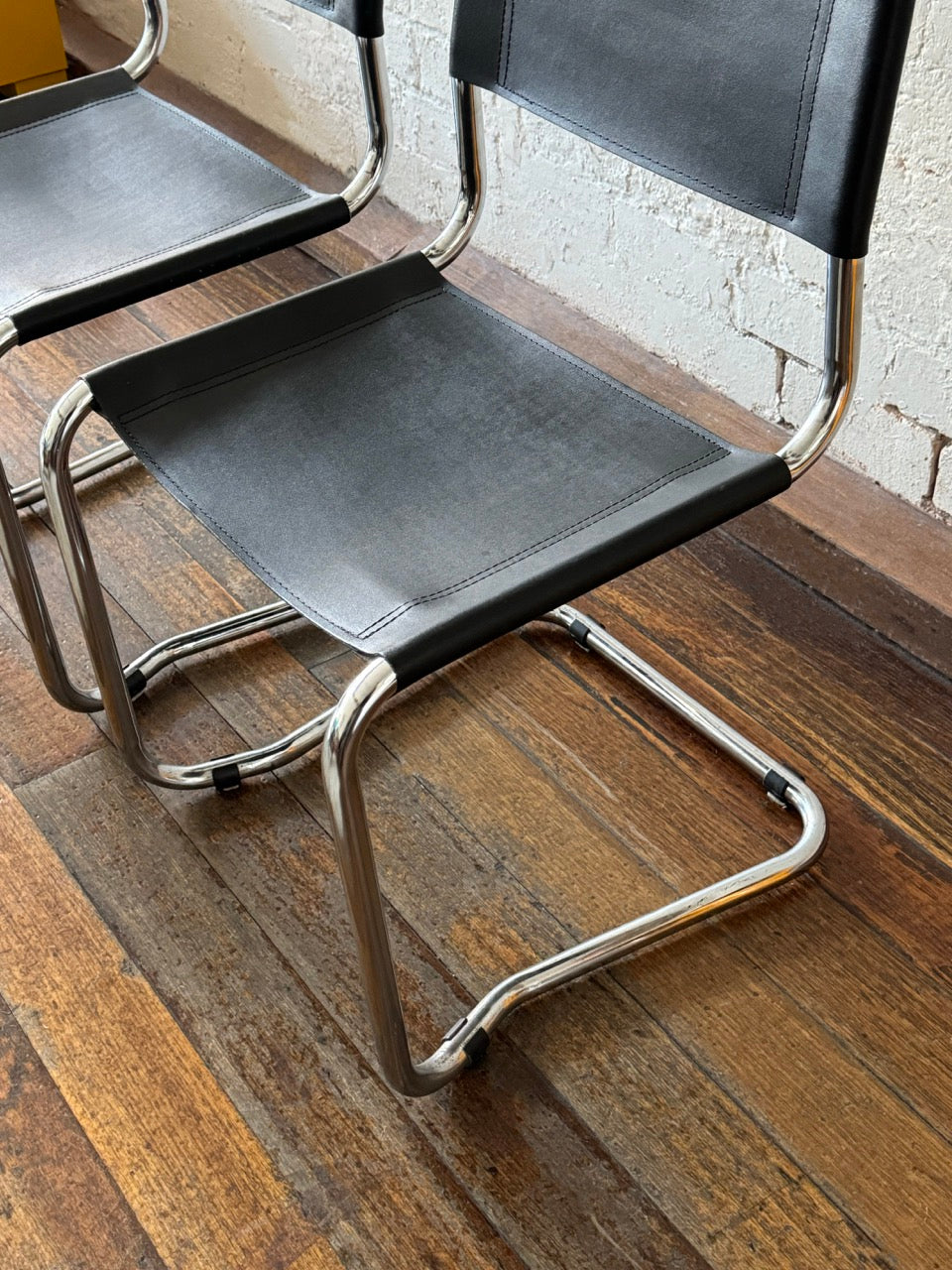 Pair of Black Leather Cantilever Chairs