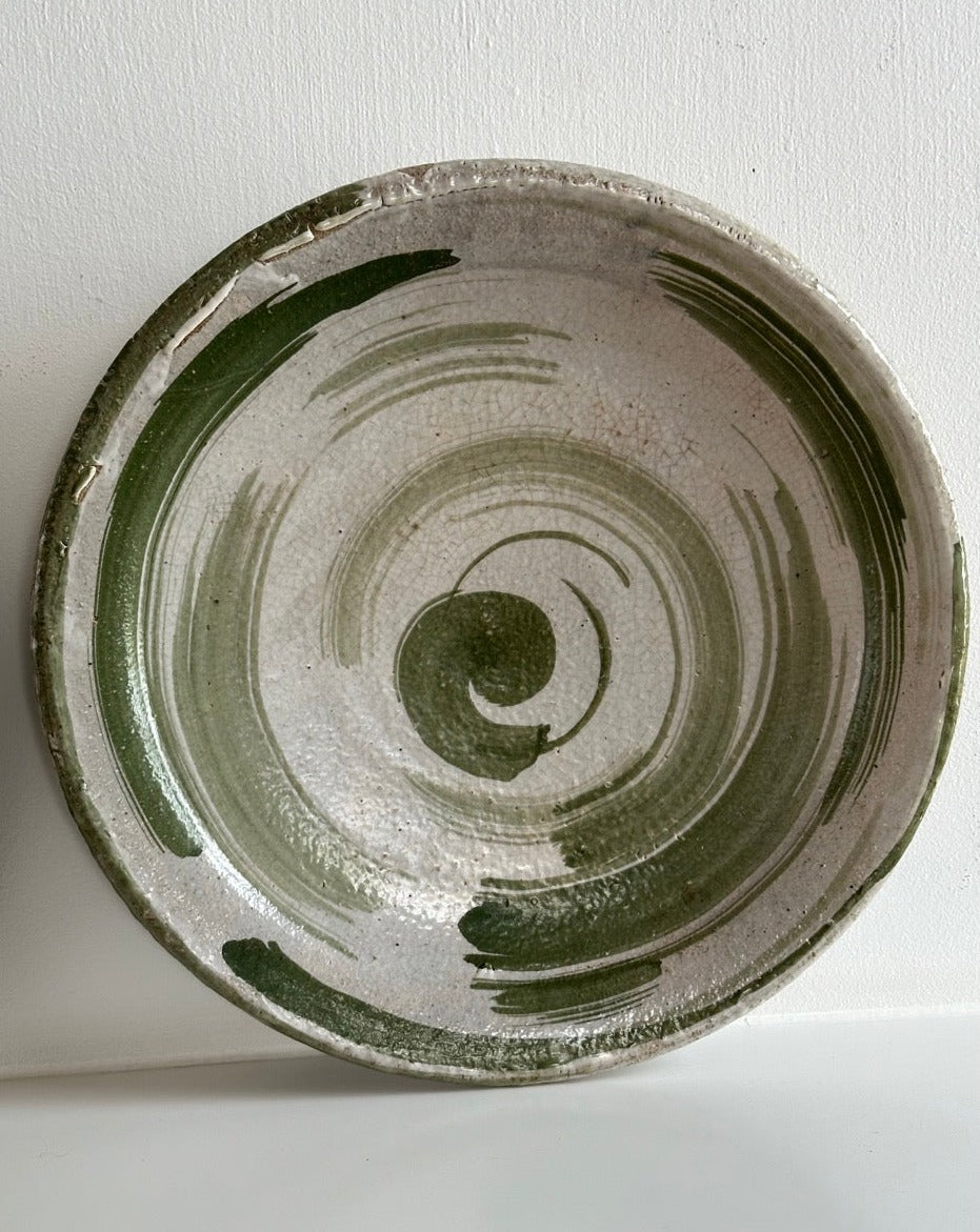 Four Glazed Earthenware Platters