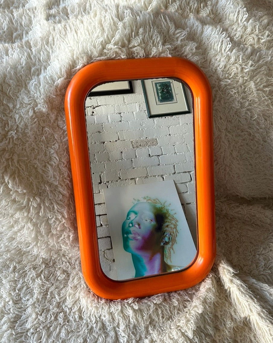 Orange Plastic Bulbous Mirror