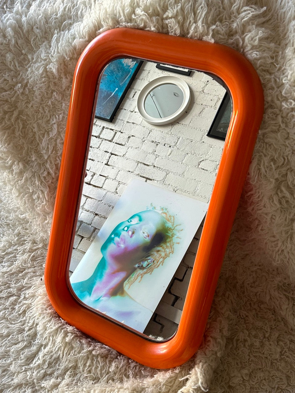 Orange Plastic Bulbous Mirror
