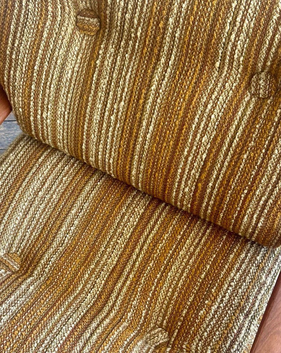 A pair of Tessa T1 Arm Chairs