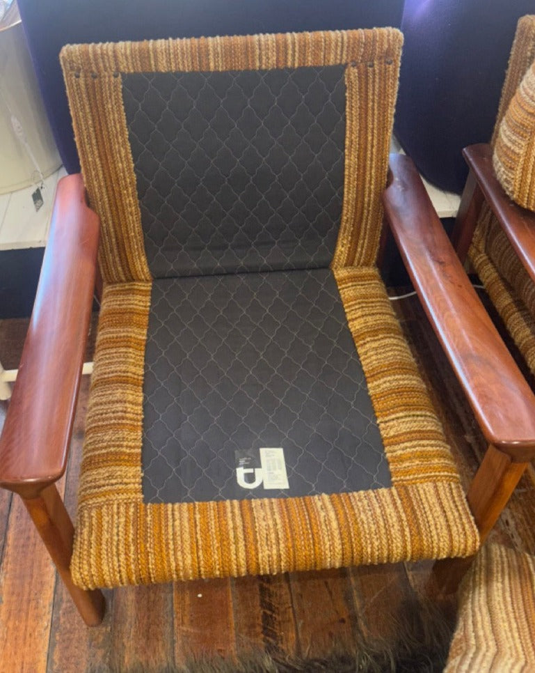 A pair of Tessa T1 Arm Chairs