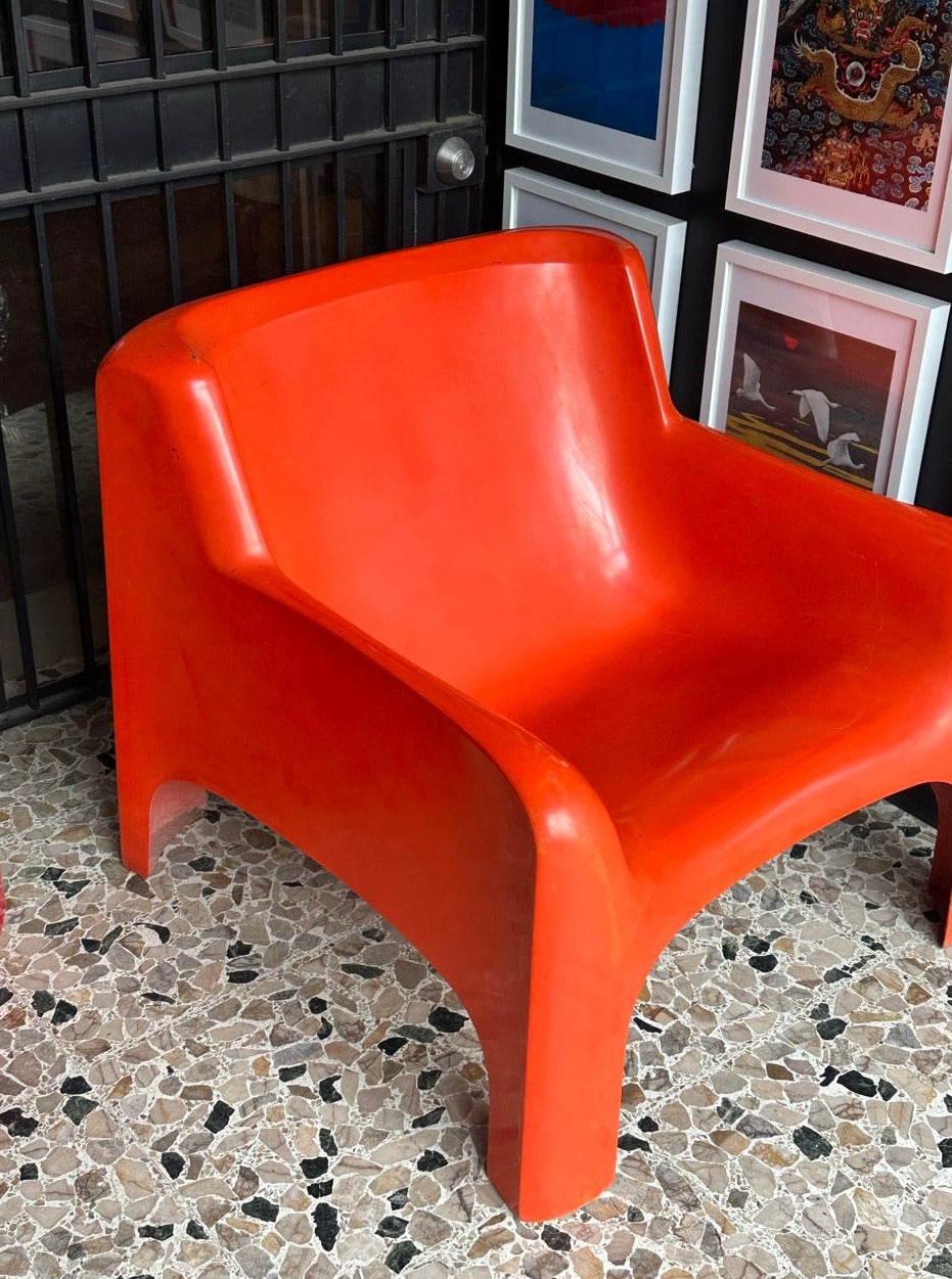 Orange Gaia lounge chair by Carlo Bartoli