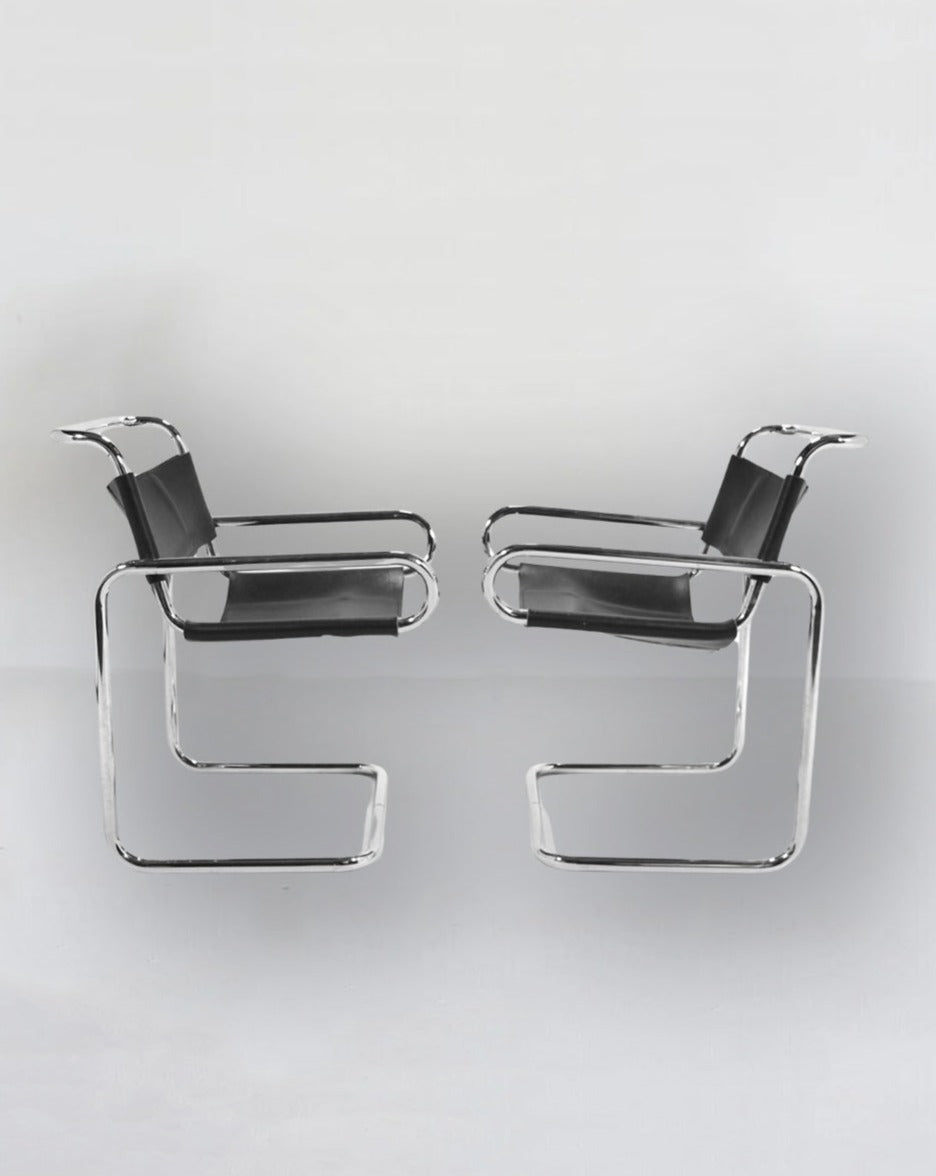 Leather Cantilevered Armchairs by Dunbar