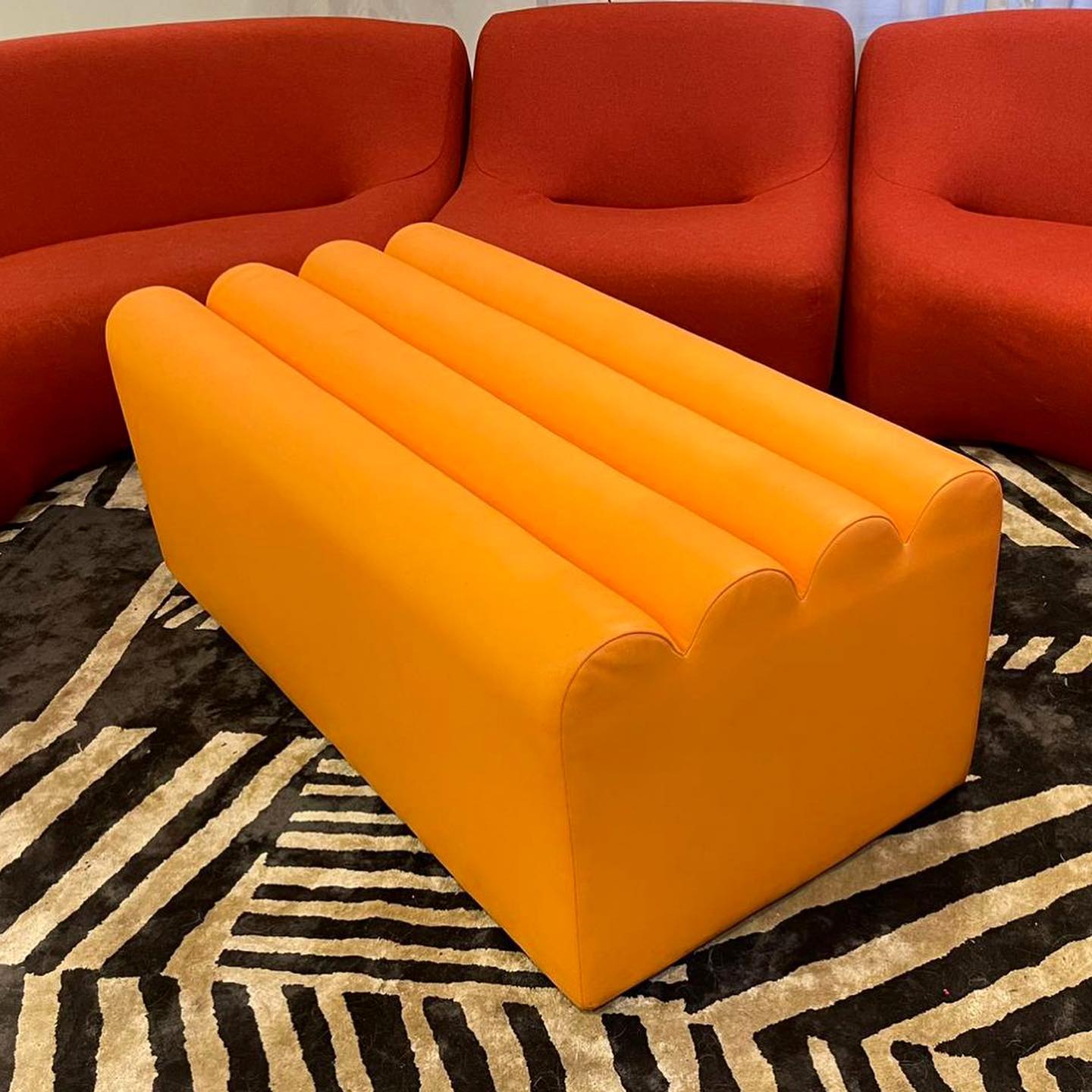 Orange Scalloped Ottoman