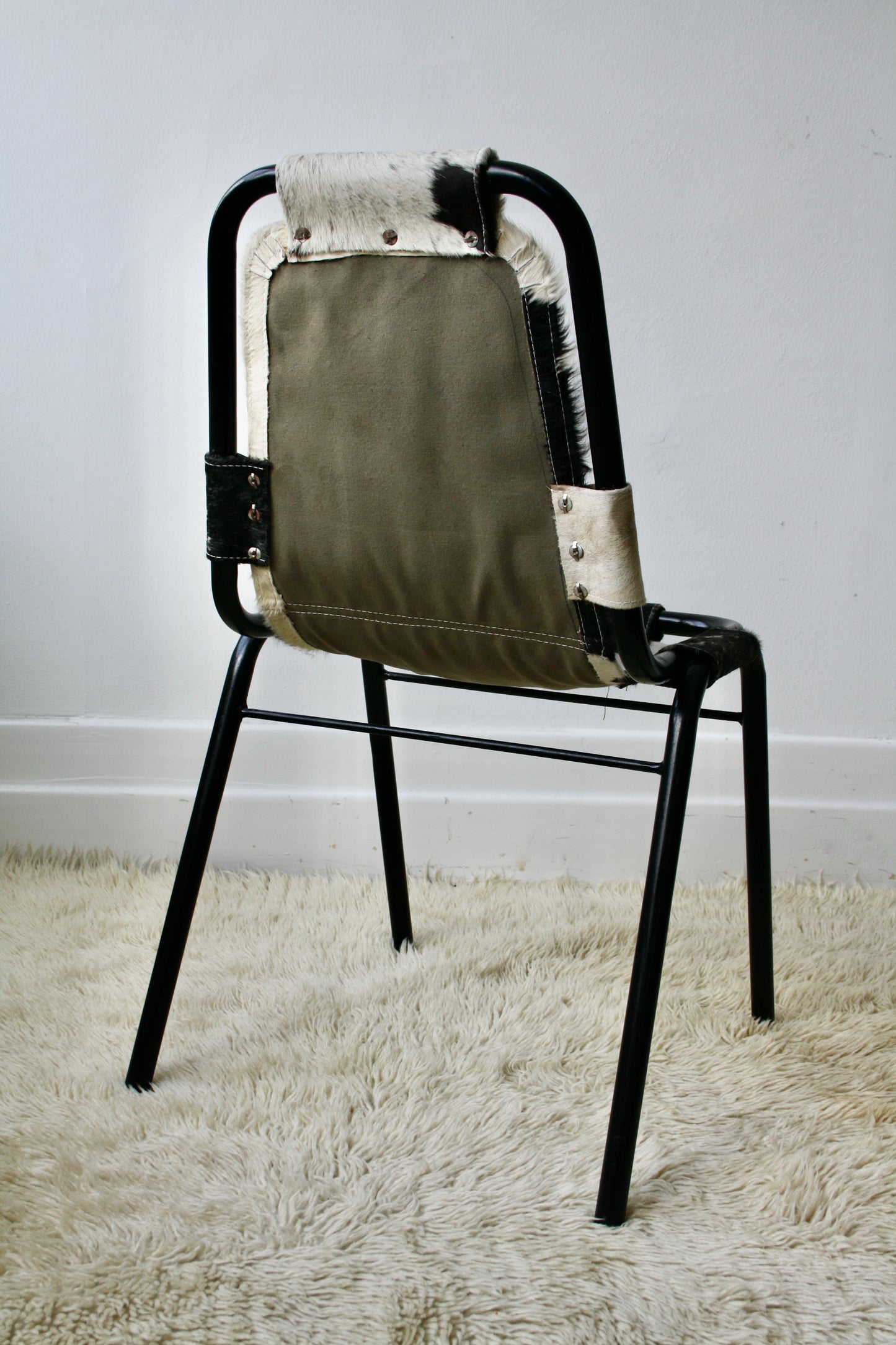 Les Arc Style Chair by Charlotte Perriand