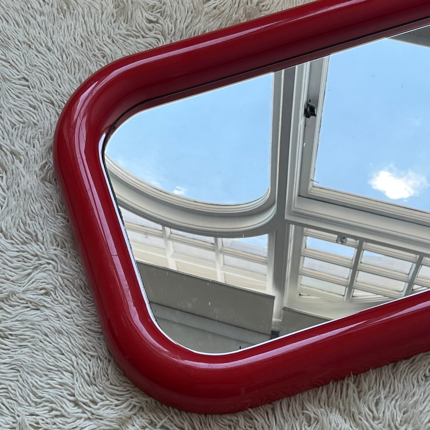 Plastic Bulbous Red Mirror