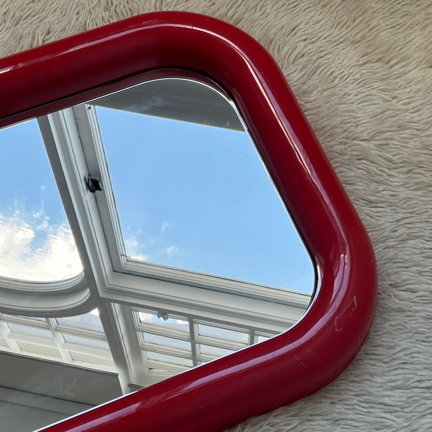 Plastic Bulbous Red Mirror
