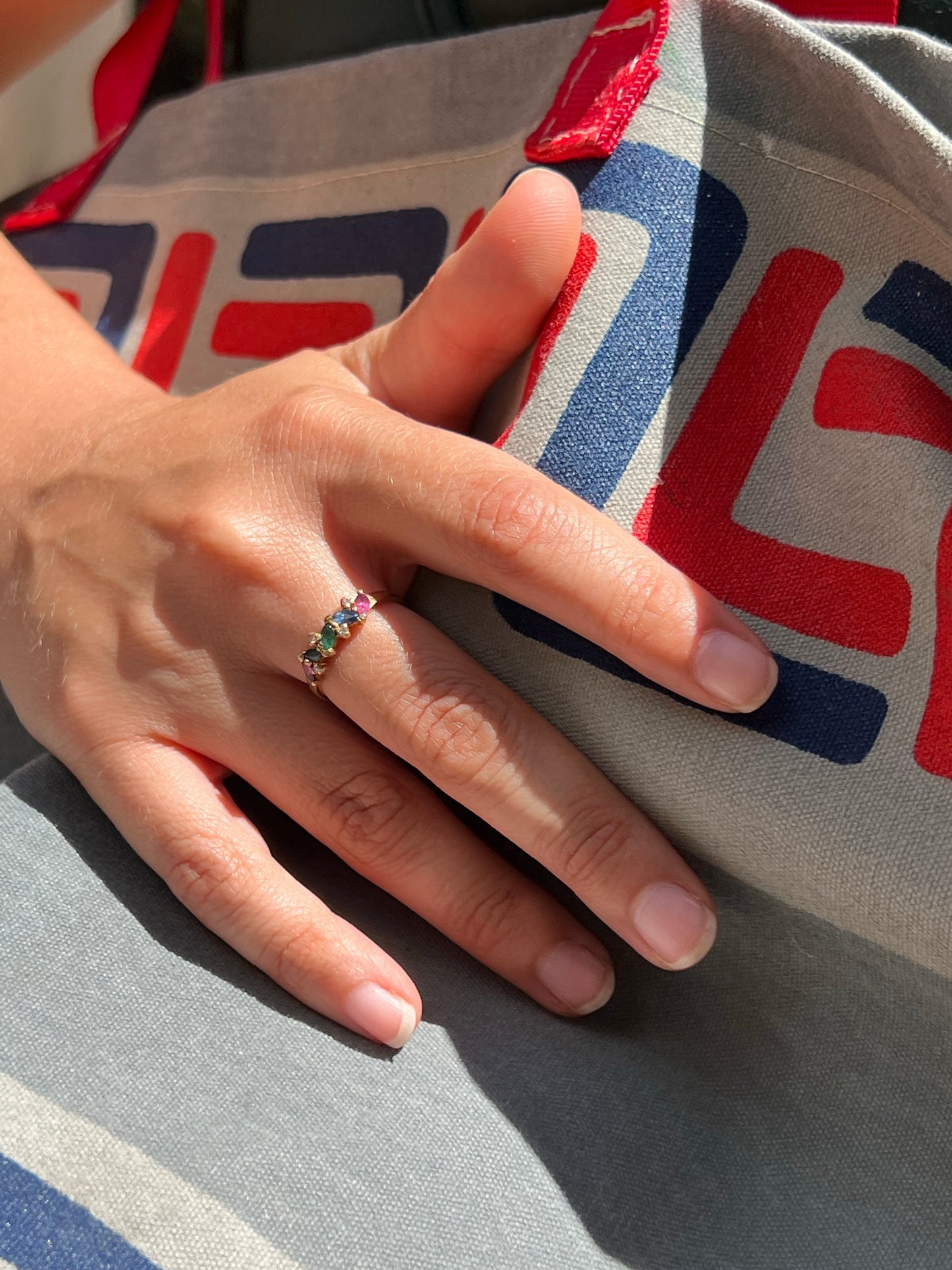 9ct gold ring with rubies, sapphires, emeralds + diamonds