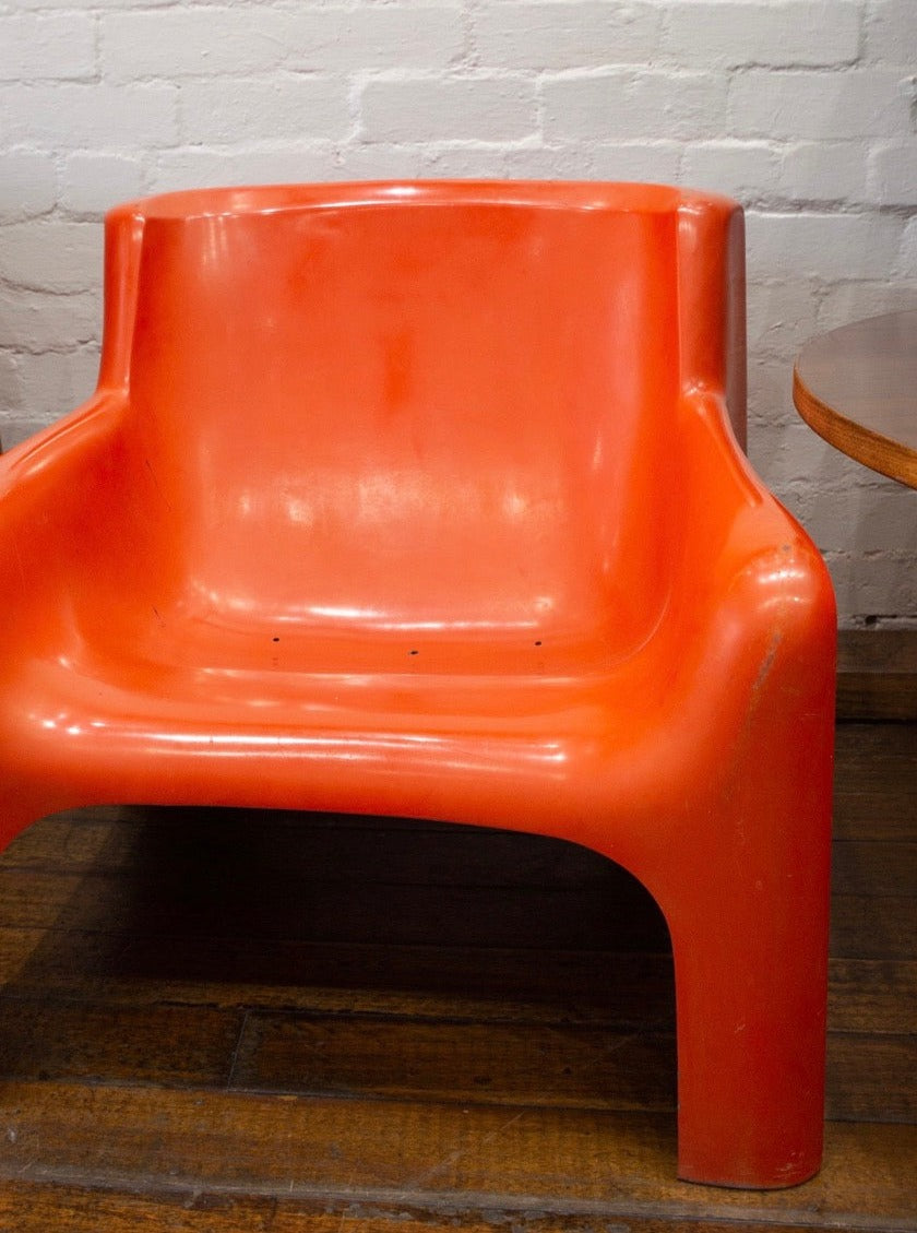 Orange Gaia lounge chair by Carlo Bartoli