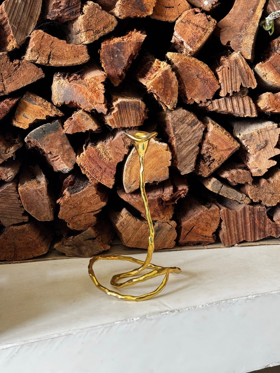 Brass Twisted Candlesticks by Mukul Goyal