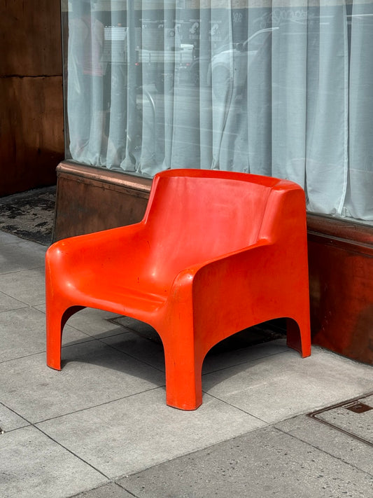 Orange Gaia lounge chair by Carlo Bartoli