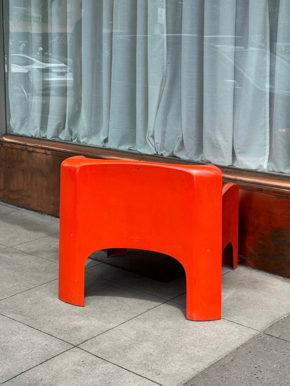 Orange Gaia lounge chair by Carlo Bartoli