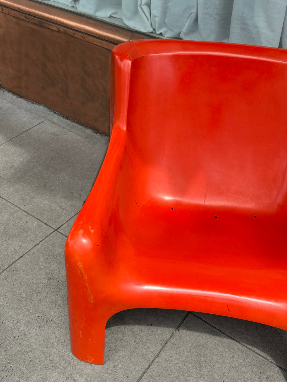 Orange Gaia lounge chair by Carlo Bartoli