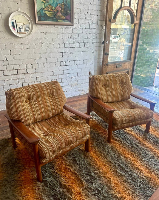 A pair of Tessa T1 Arm Chairs