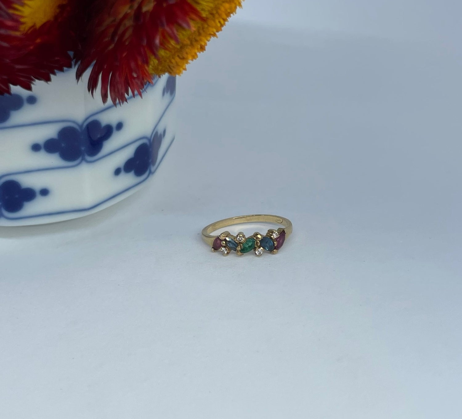 9ct gold ring with rubies, sapphires, emeralds + diamonds