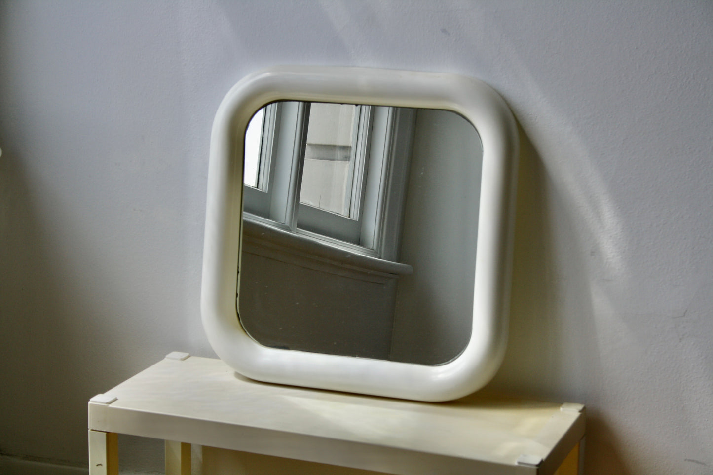 White Plastic Bulbous Mirror
